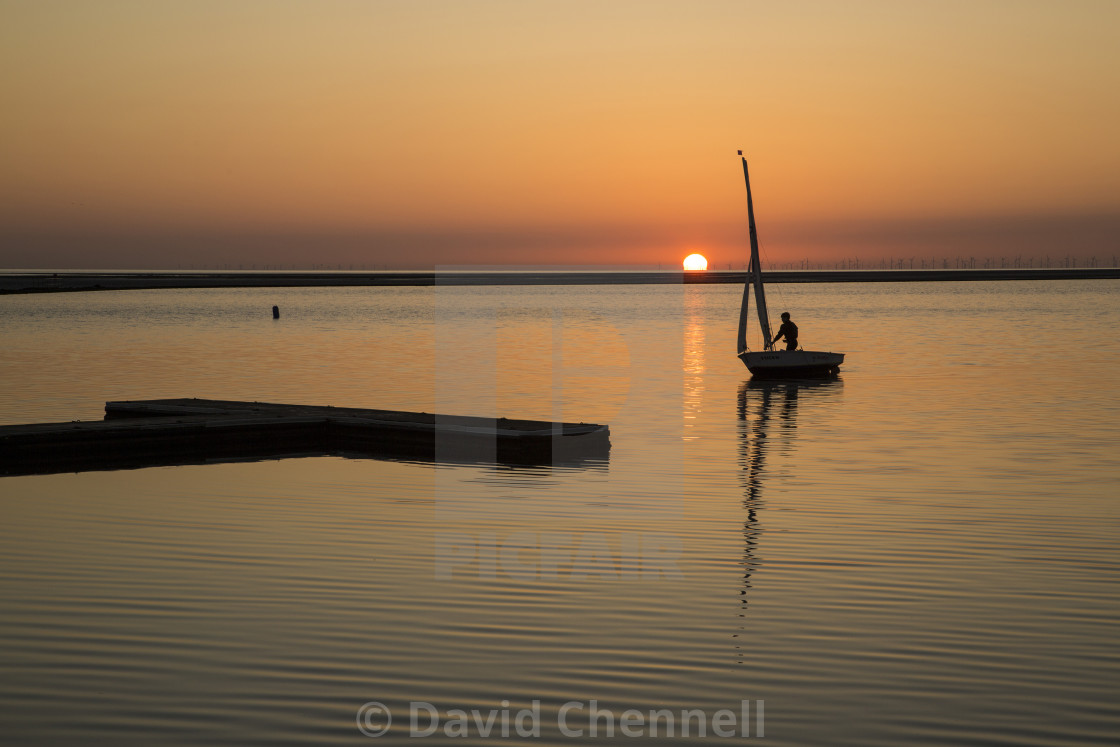"Sunset Sailing" by David Chennell - £12.40 "Sunset Sailing" stock image