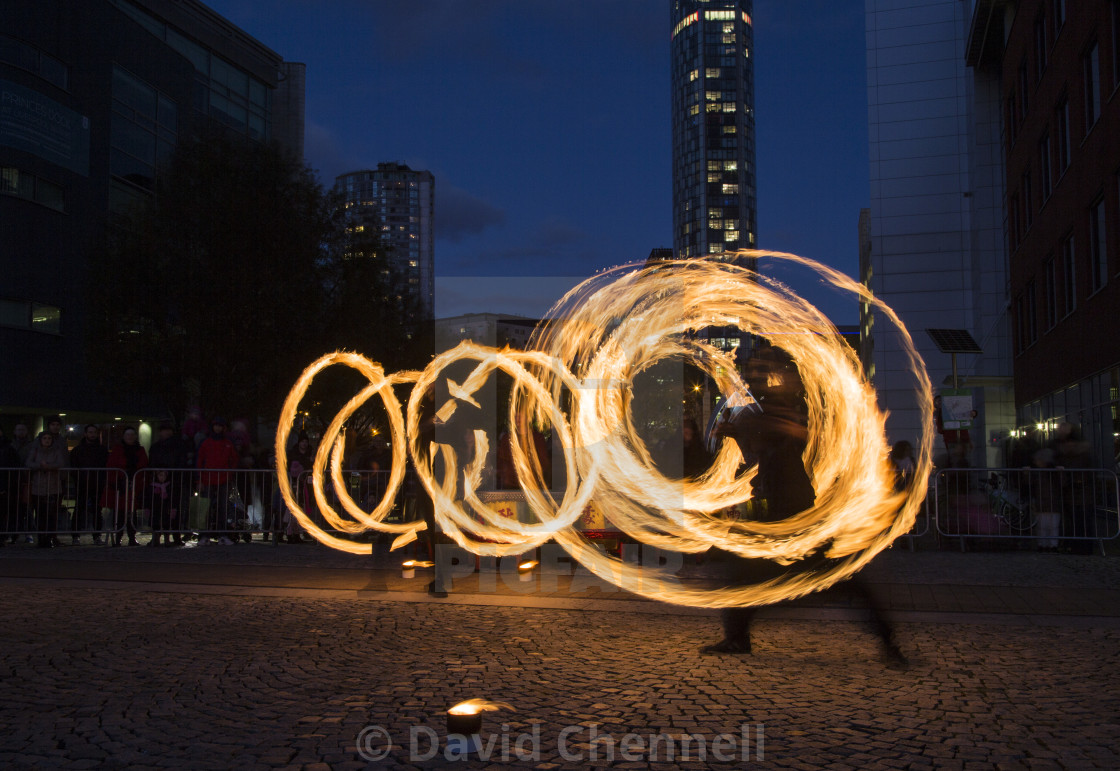 "Fire Spinning" by David Chennell - £12.40 "Fire Spinning" stock image