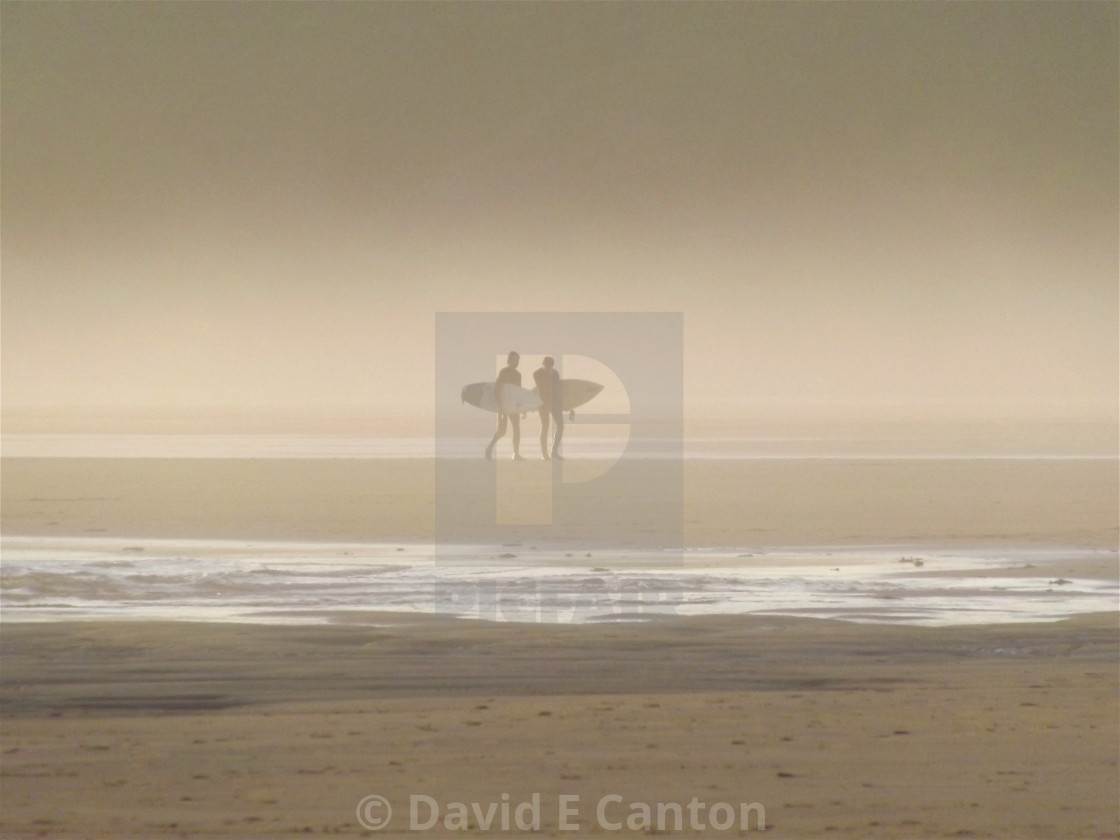 "Surfers on Pembrokeshire beach" stock image