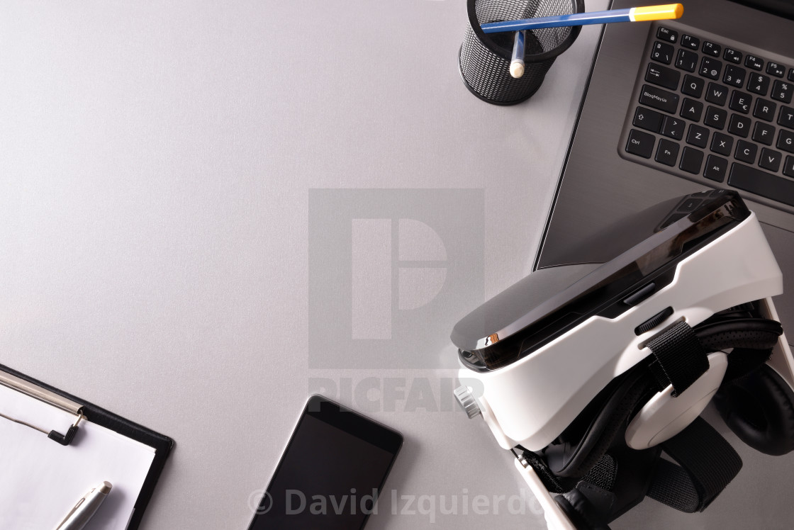 Virtual Reality Glasses On Business Office Table Top View