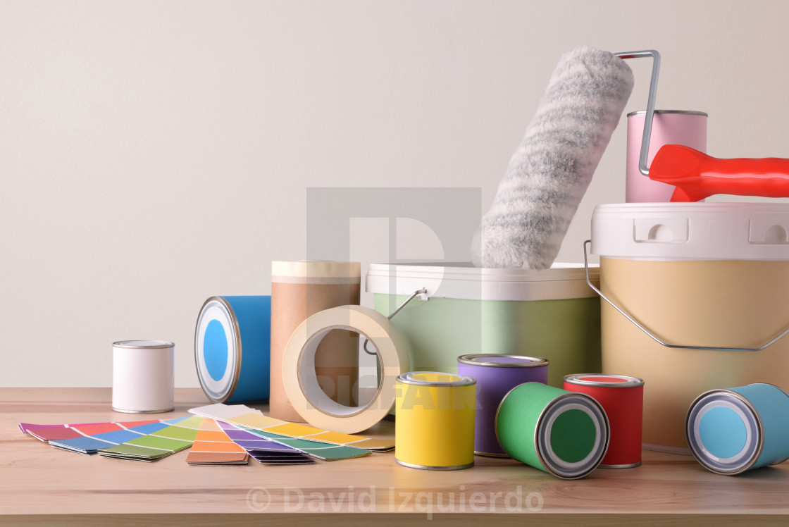 Table With Painting Tools For Home White Wall Background
