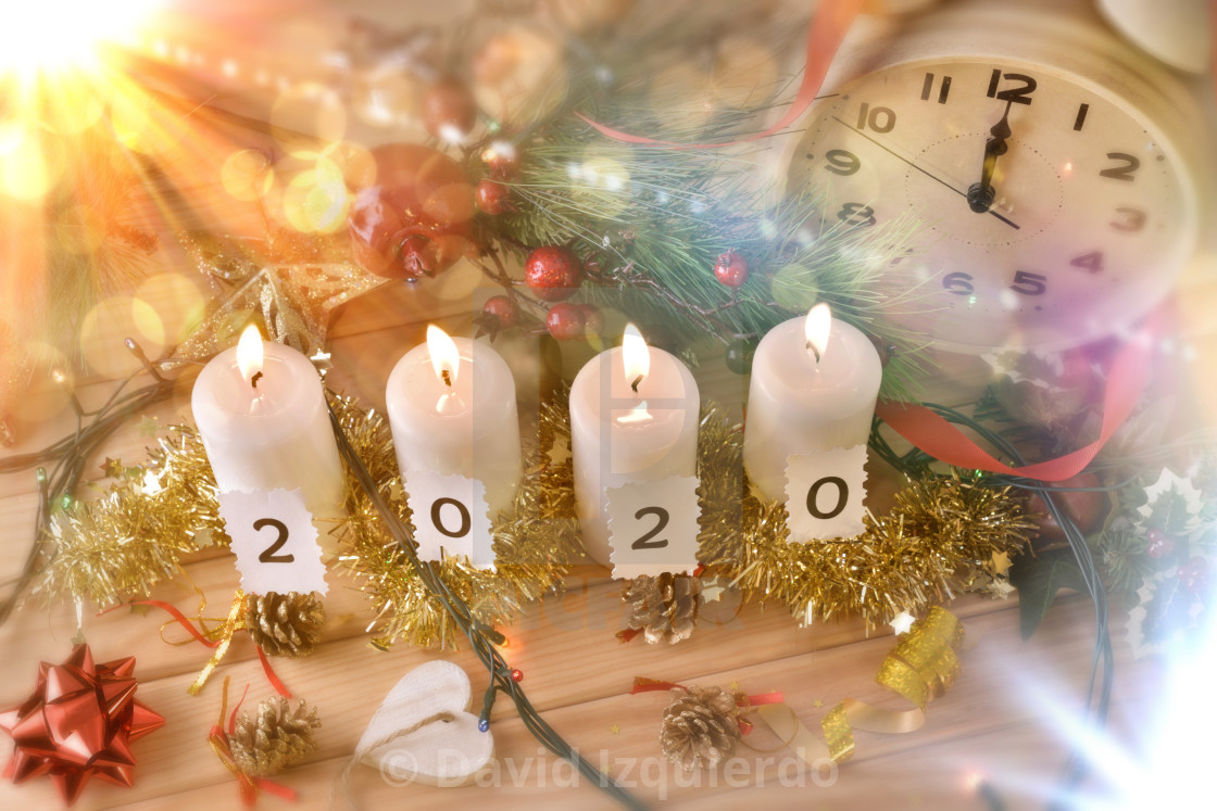 Candles And Clock On Table Celebrating New Year 2020 Top License