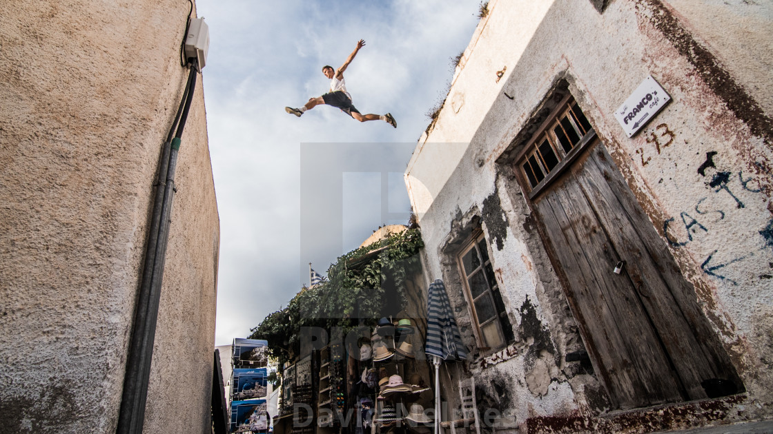 "Striding The White Rooftops." stock image