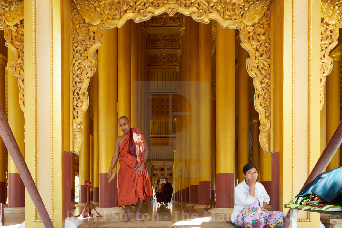 "Monk in the Yadanabon San Kyaung at the foot of Mandalay Hill, Mandalay, Myanmar" stock image