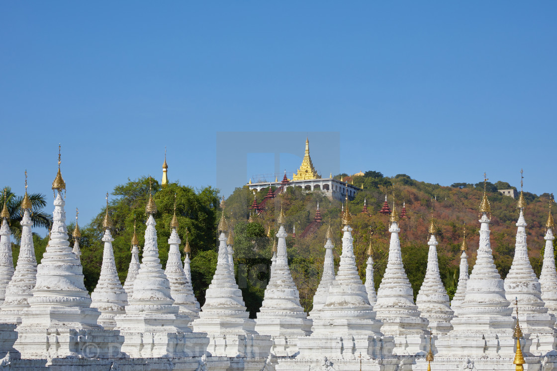 "Some of the 729 'kyauksa gu' or stone-inscription caves at the Kuthodaw..." stock image