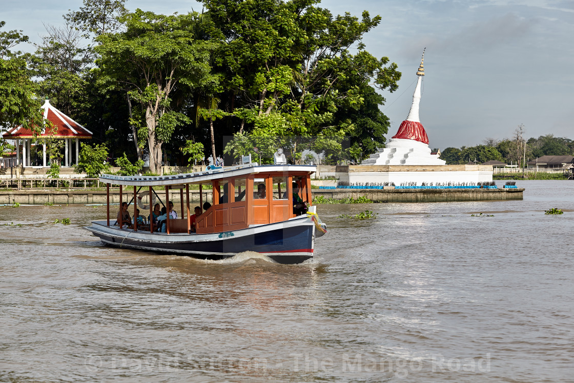 "A ferry passes in front of the lop-sided Mu Tao Chedi. The chedi is part of..." by David Sutton - The Mango Road - $30.13 "A ferry passes in front of the lop-sided Mu Tao Chedi. The chedi is part of..." stock image