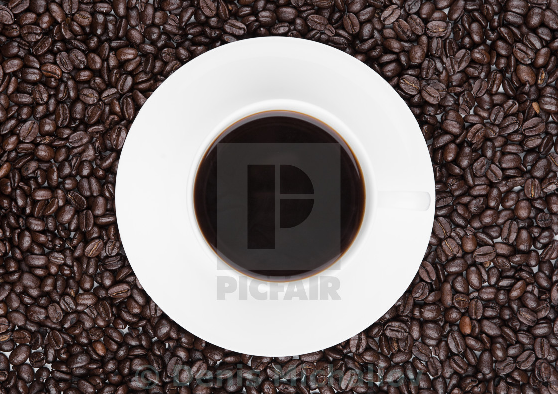 "Cup of black coffee for breakfast with beans on coffee beans background" by Denis Michaliov - $3.08 "Cup of black coffee for breakfast with beans on coffee beans background" stock image