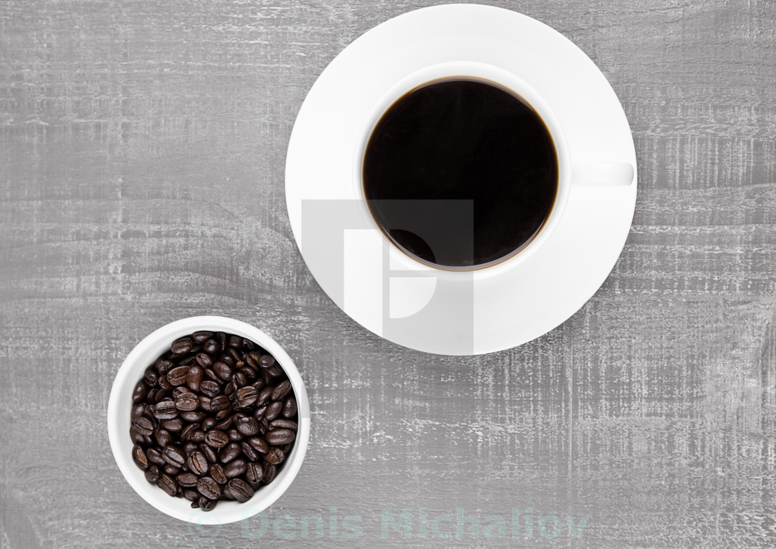 "Cup of black coffee for breakfast with beans on coffee beans background" by Denis Michaliov - $3.08 "Cup of black coffee for breakfast with beans on coffee beans background" stock image