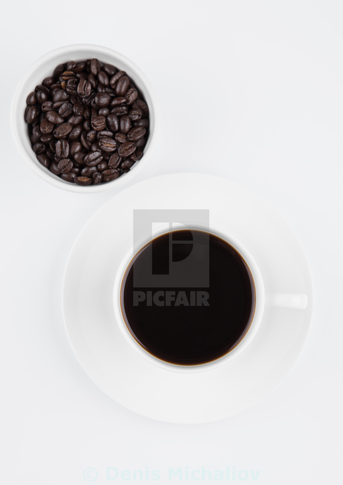 "Cup of black coffee for breakfast with beans on white background" by Denis Michaliov - $3.08 "Cup of black coffee for breakfast with beans on white background" stock image