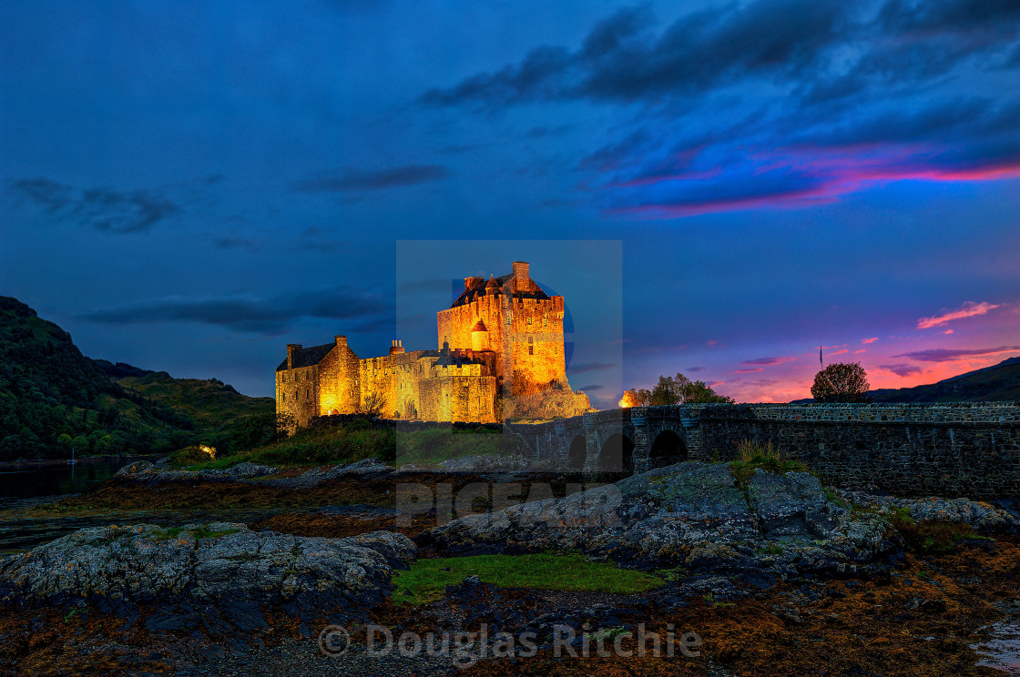 "Floodlit Eilean Donan Castle" stock image