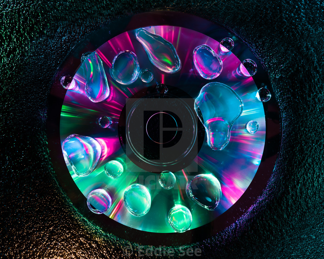 "CD water droplet reflections" by Eddie See - £4.96 "CD water droplet reflections" stock image
