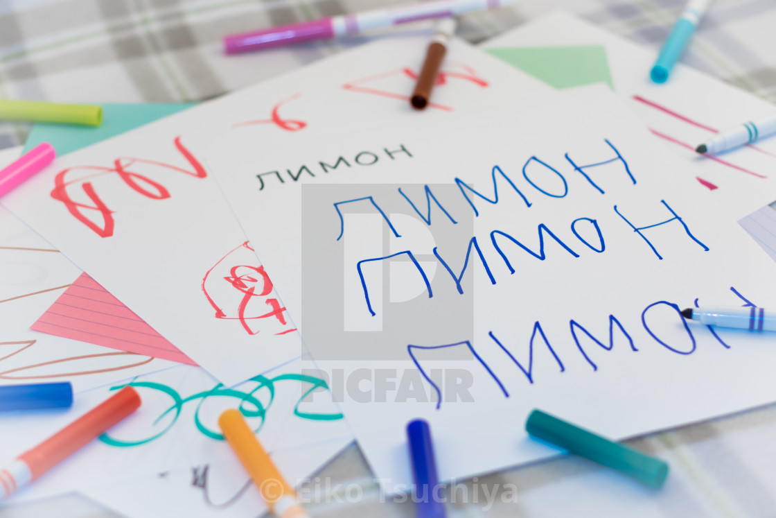 Russian Kids Writing Name Of The Fruits For Practice