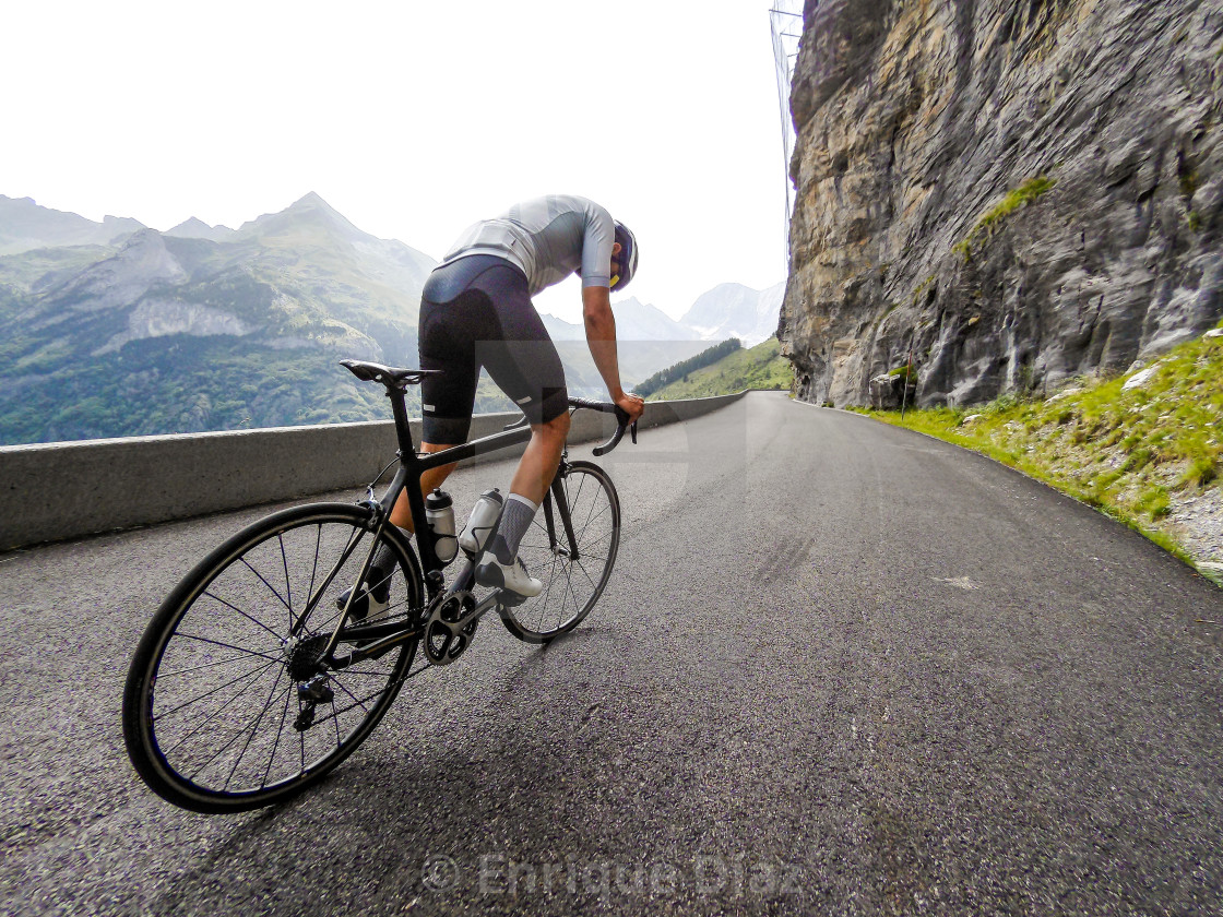 "Cyclist mid climb in the French Pyrenees" stock image