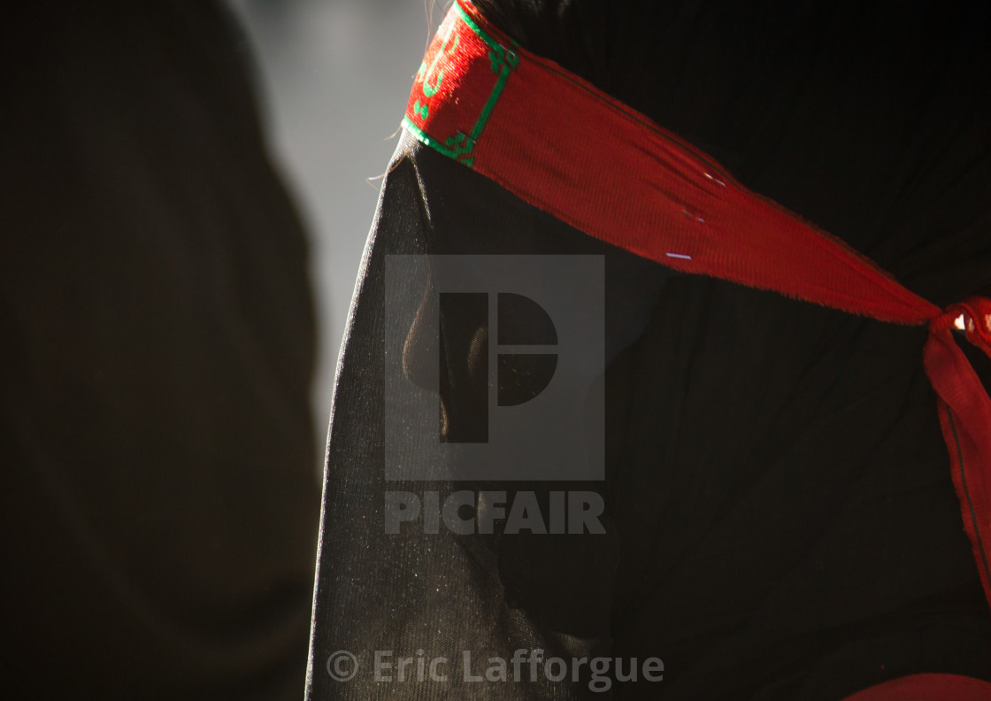 "Iranian shiite muslim woman mourning imam Hussein on the day of Tasua with..." stock image