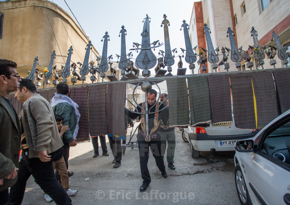 "Iranian Shiite Muslim Man Carry An Alam On Tasua Celebration, Lorestan..." stock image