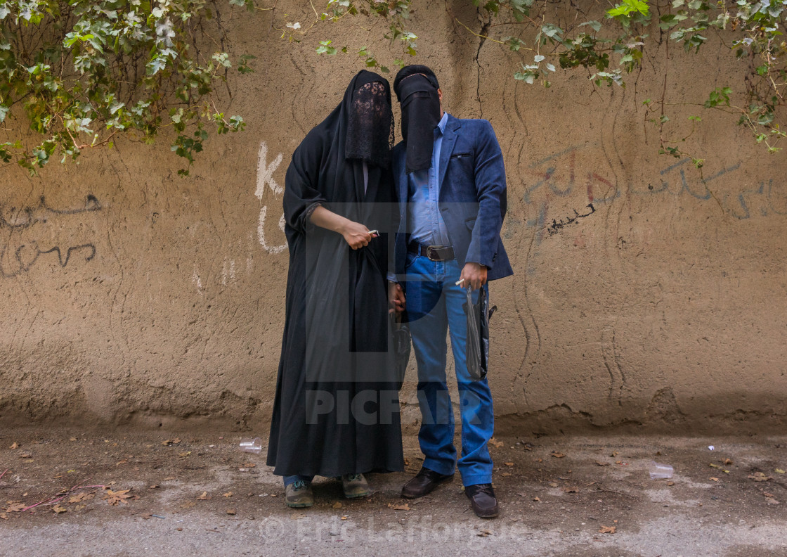 "Iranian Shiite Muslim Couple Mourning Imam Hussein On The Day Of Tasua With..." stock image