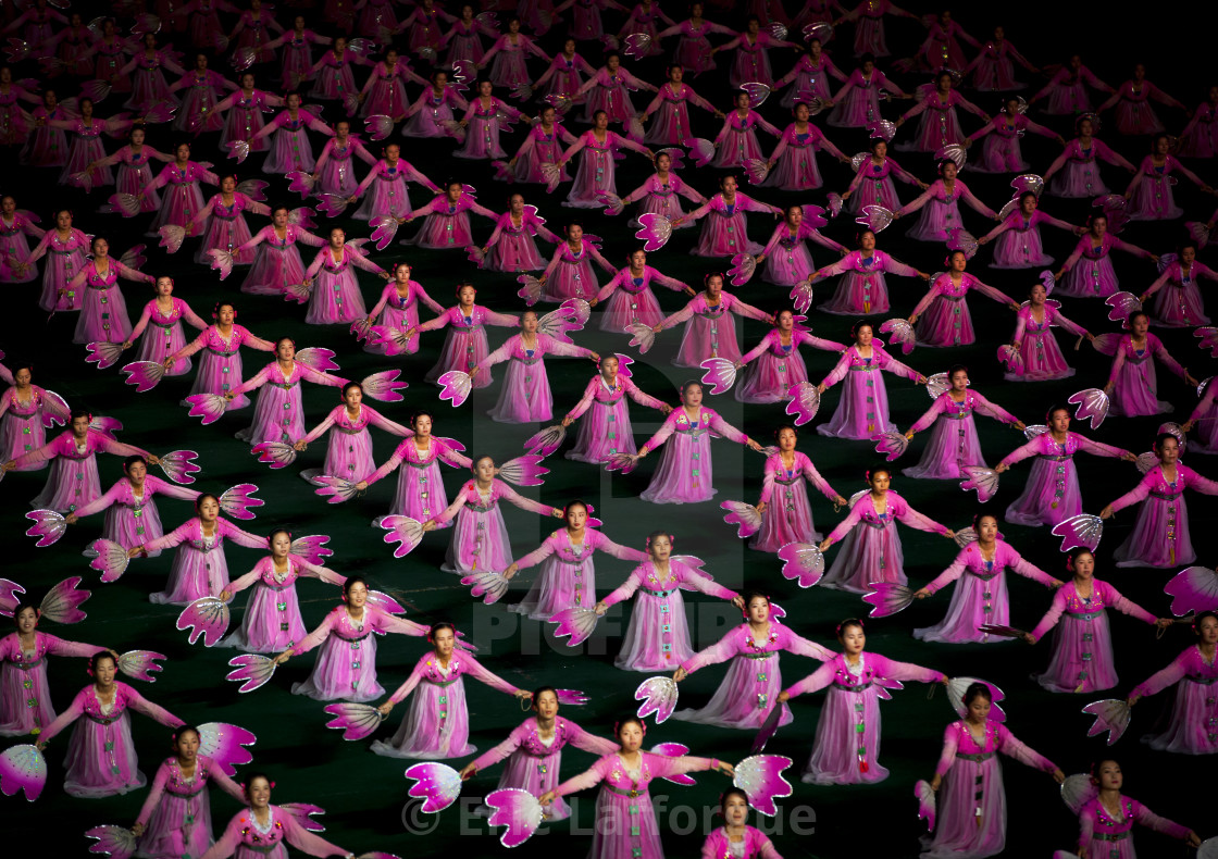 "North Korean women dancing in choson-ot during the Arirang mass games in may..." stock image