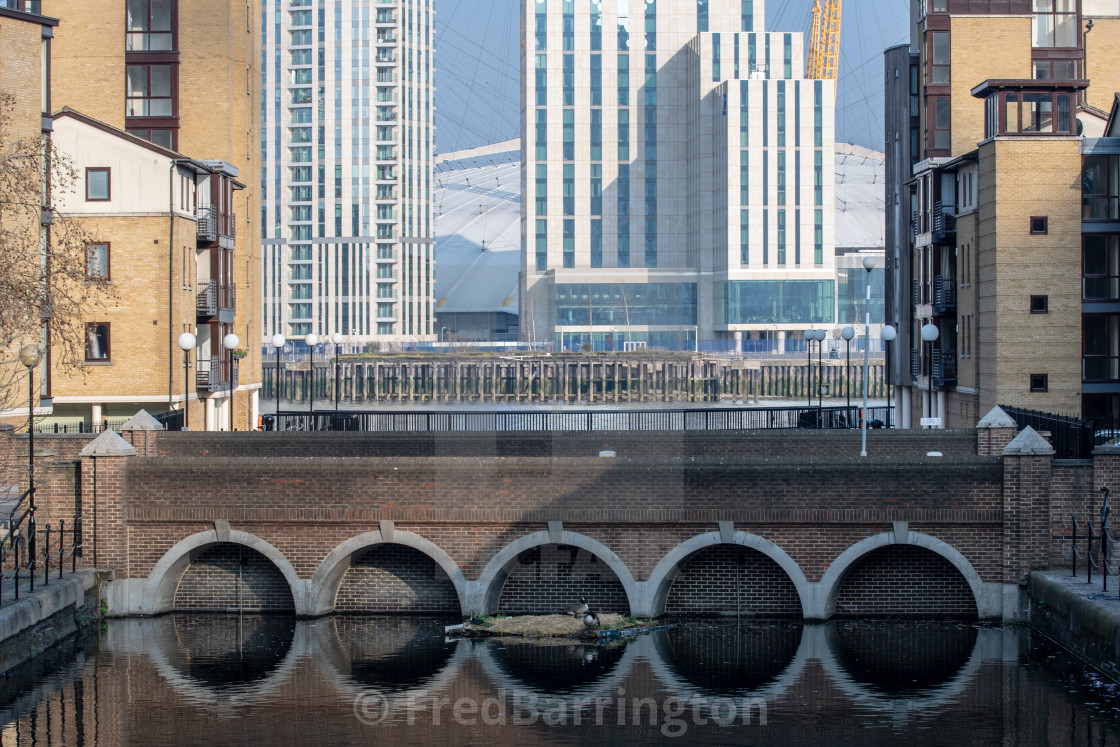 "Canada Geese nesting in arches at Canary Wharf" stock image