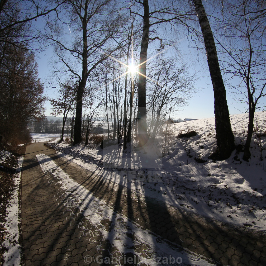 "the sun with long shadows" stock image