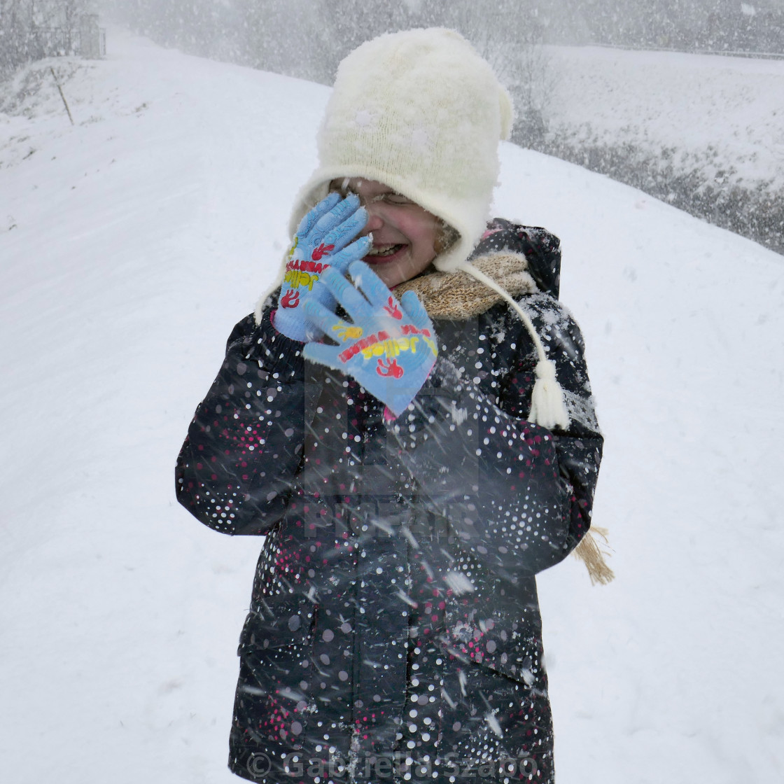 "play in the snowfall" stock image