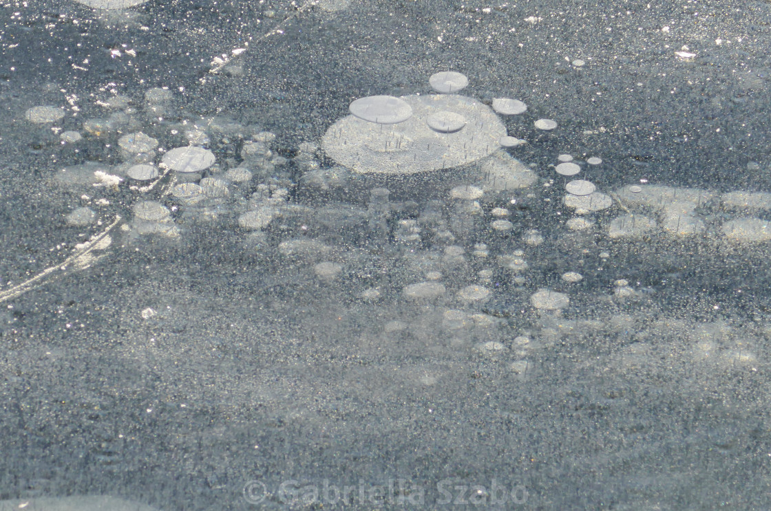 "frozen bubbles in the ice" stock image