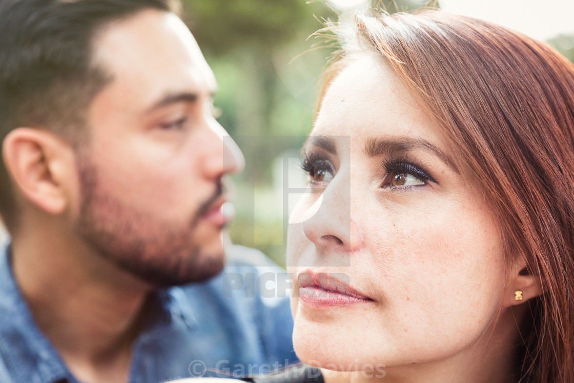 "Portrait of a red haired girl with her partner in the background" by Gareth Davies - $28.04 "Portrait of a red haired girl with her partner in the background" stock image