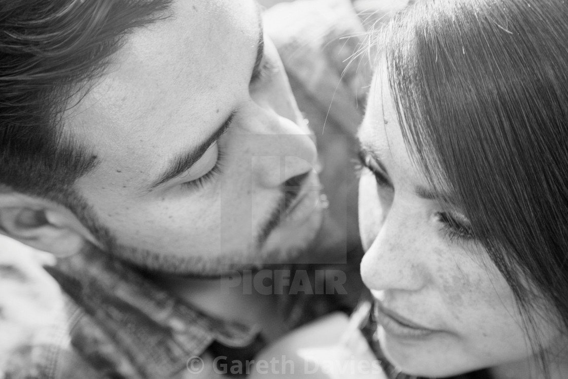 "Black and white portrait of a couple looking at one another intimately and closely" by Gareth Davies - $31.15 "Black and white portrait of a couple looking at one another intimately and closely" stock image