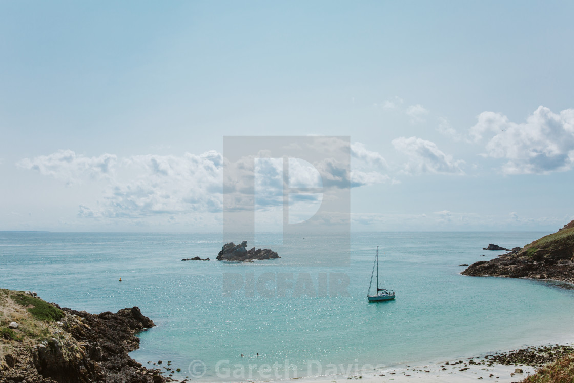 "A yacht moored in a beautiful bay in Herm in the Channel Islands (UK)" by Gareth Davies - $1.56 "A yacht moored in a beautiful bay in Herm in the Channel Islands (UK)" stock image