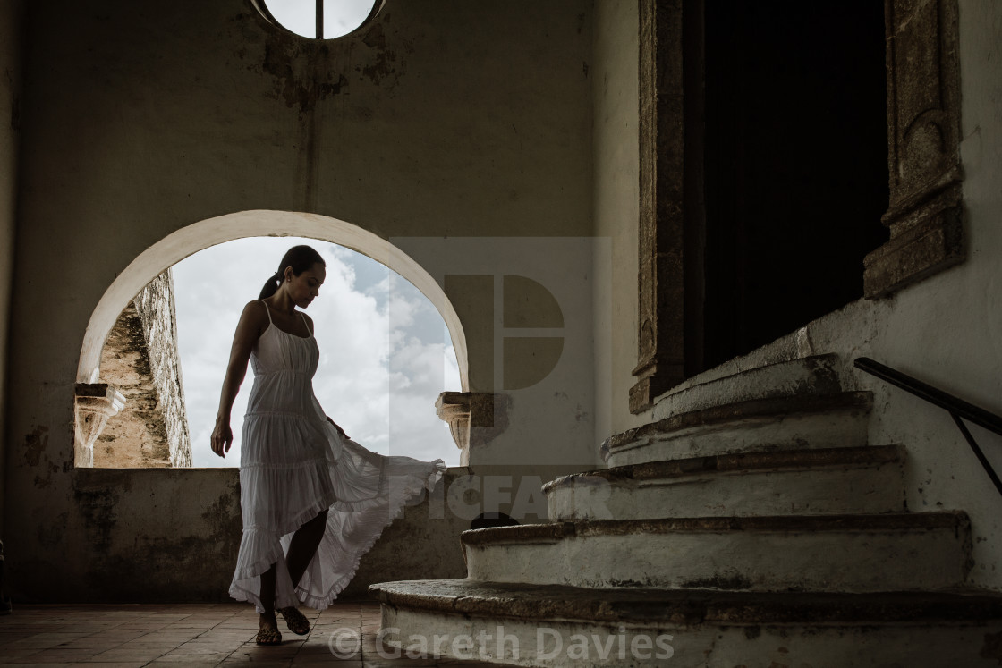 "a lady in a white dress in a franciscan monastery in mexico" by Gareth Davies - $3.12 "a lady in a white dress in a franciscan monastery in mexico" stock image