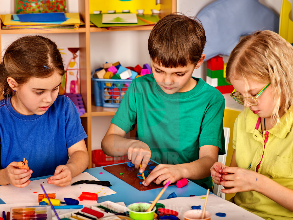 Small Students Girl Painting In Art School Class License