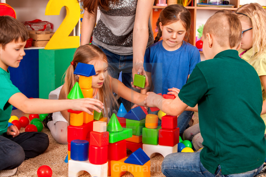 kids playing with building blocks