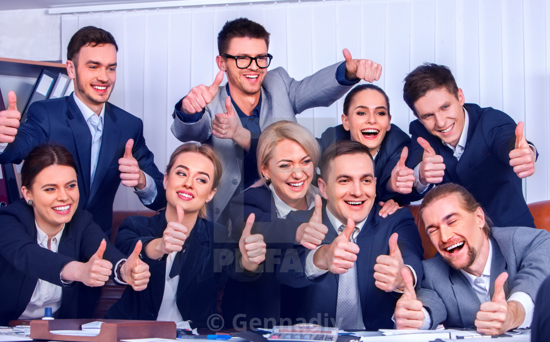 Business people office life of team people are happy with thumb up. -  License, download or print for £ | Photos | Picfair