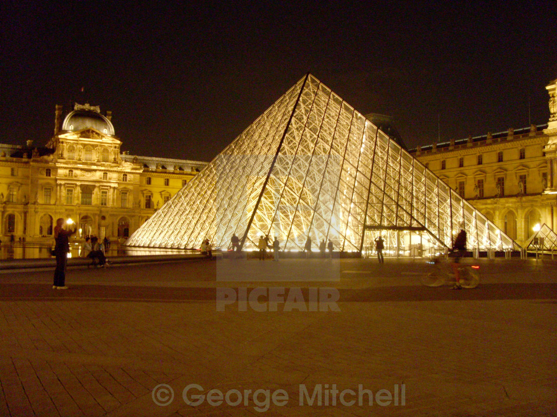 "The Louvre Museum at Night" stock image