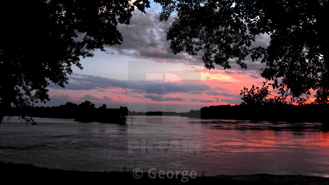 "Sunset on the Arkansas River" by George - $61.24 "Sunset on the Arkansas River" stock image