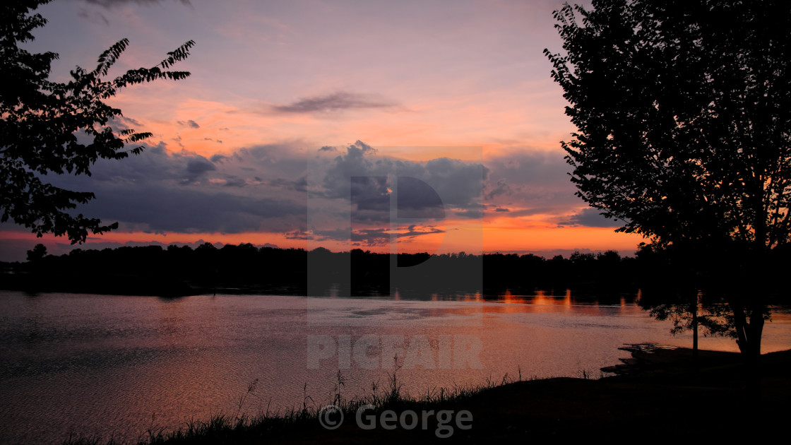 "Arkansas River Sunset" by George - $61.24 "Arkansas River Sunset" stock image