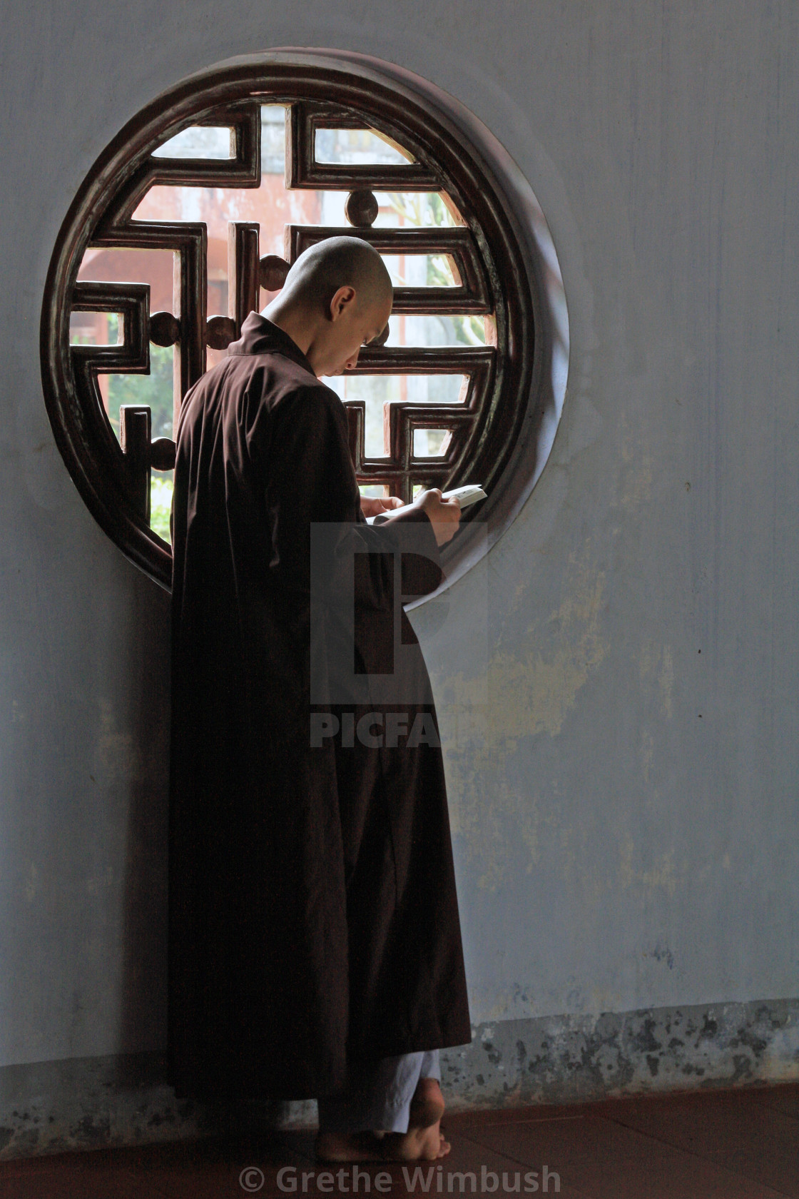 "Vietnamese monk studying" stock image