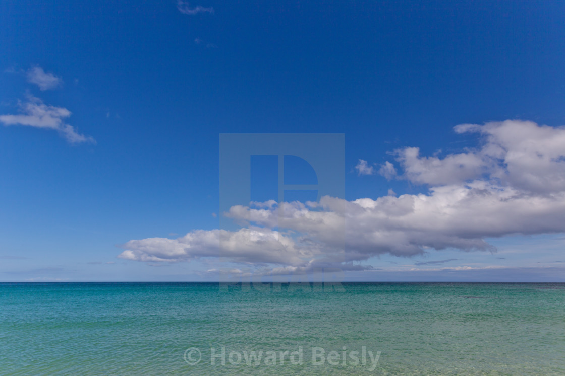 "Turquoise sea, blue sky, white clouds" stock image