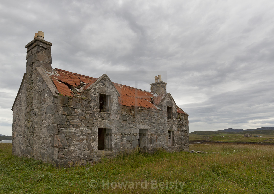 "A deserted, lonely house with a red roof" stock image