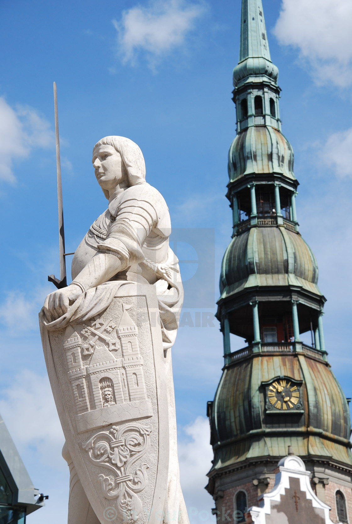 "Roland statue and St.Peter's Church, Riga" by In Your Pocket - $7.65 "Roland statue and St.Peter's Church, Riga" stock image