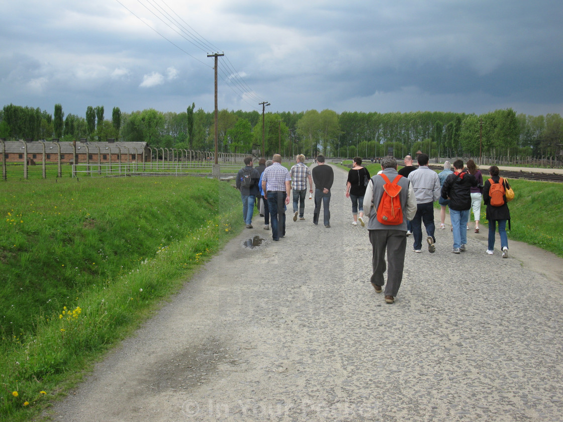 "Tourists at Auschwitz-Birkenau" by In Your Pocket - $3.06 "Tourists at Auschwitz-Birkenau" stock image