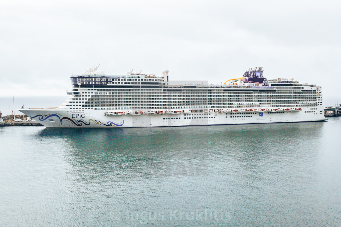 "huge cruise ship docked at the Madeira island" stock image