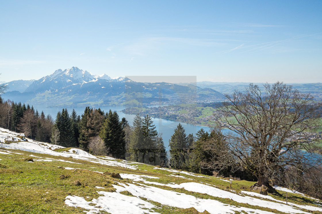 "River valley view and snowy mountains peaks in the background" stock image