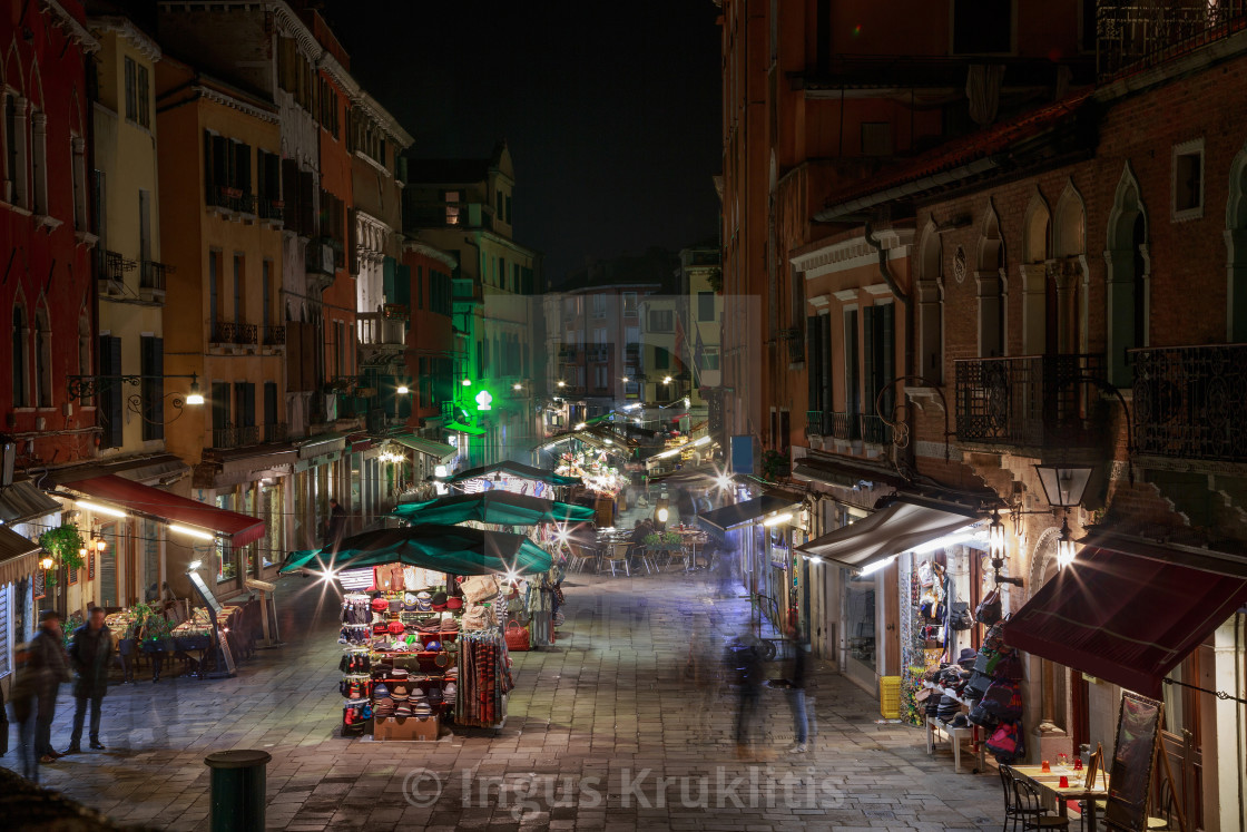 "Beautiful Venice night life with many lights on a market with many people..." stock image