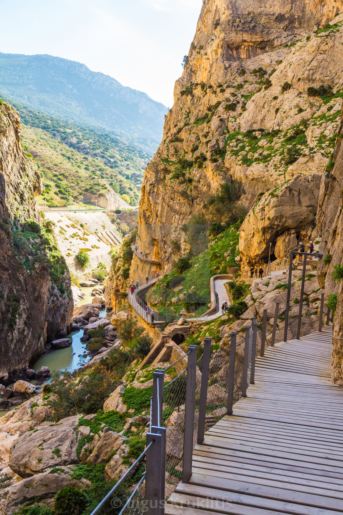 "Wooden paths encrusted in a rock over a river" stock image