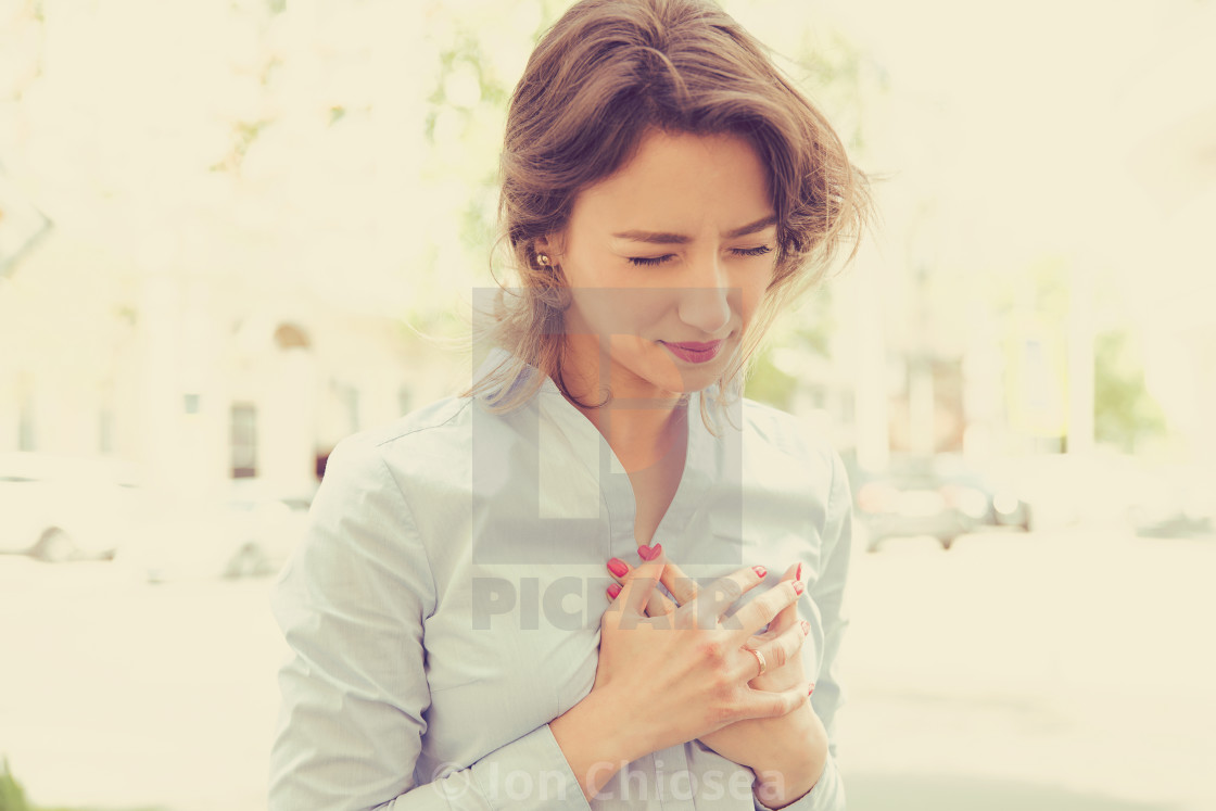 Woman Standing On A City Street Having Heart Pain License Download Or Print For 12 40 Photos Picfair 177 free images of heart pain. picfair