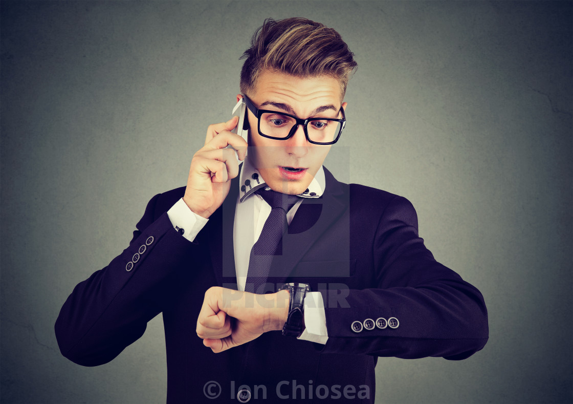 Businessman Looking At Wrist Watch Talking On Mobile Phone Running Late For Meeting Time Is Money License Download Or Print For 12 40 Photos Picfair 4k and hd video ready for any nle immediately. https www picfair com pics 05930156 businessman looking at wrist watch talking on mobile phone running late for meeting time is money