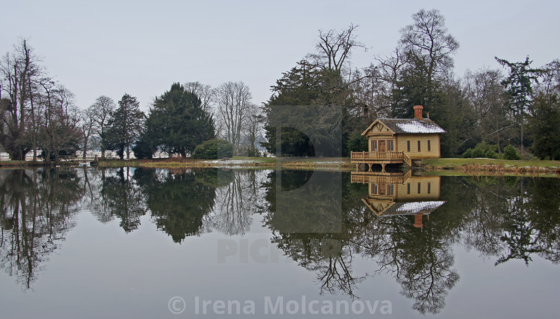 Lake Boat House And Water Reflections License Download Or