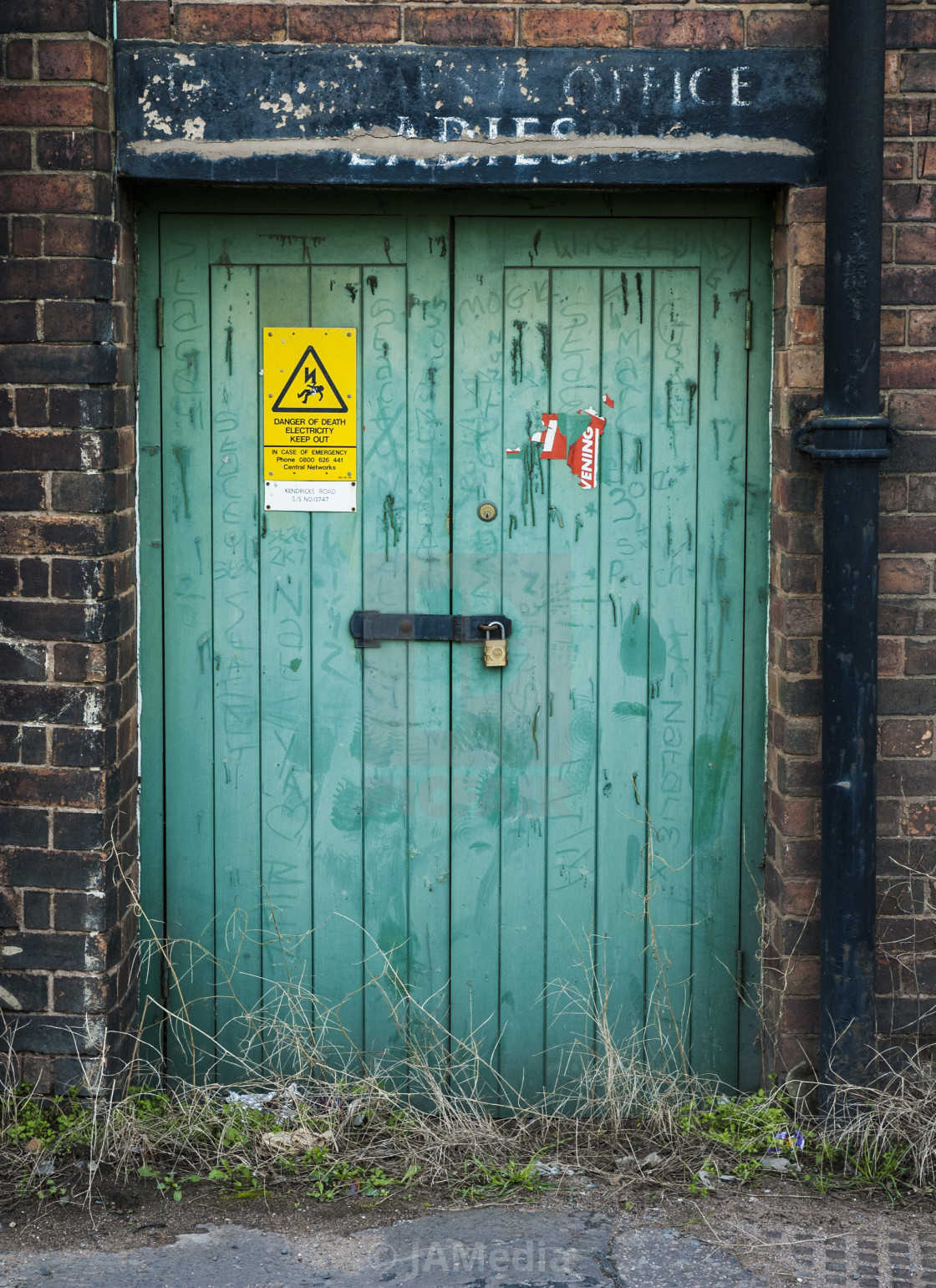 "GREEN FACTORY DOOR" stock image