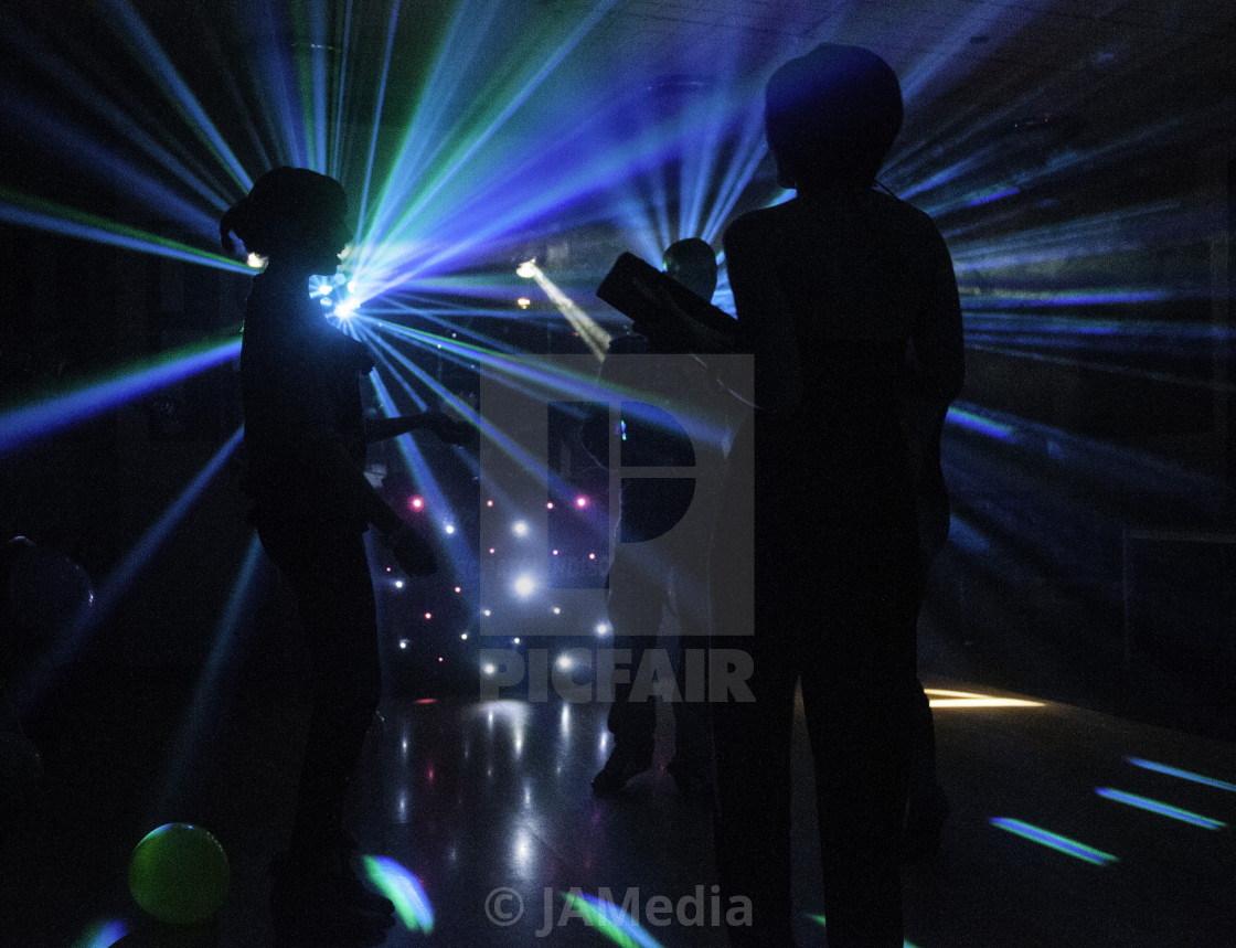 "Disco lights and dancing shadows" stock image