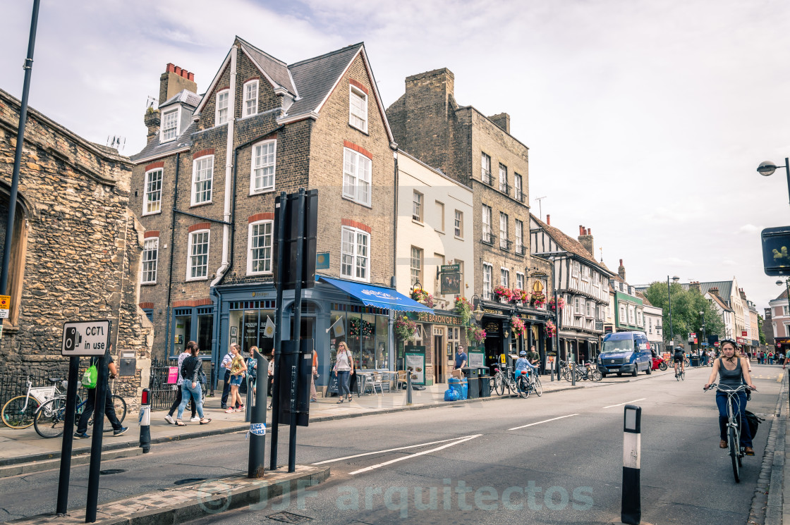 "Woman on bicycle in Cambridge" stock image